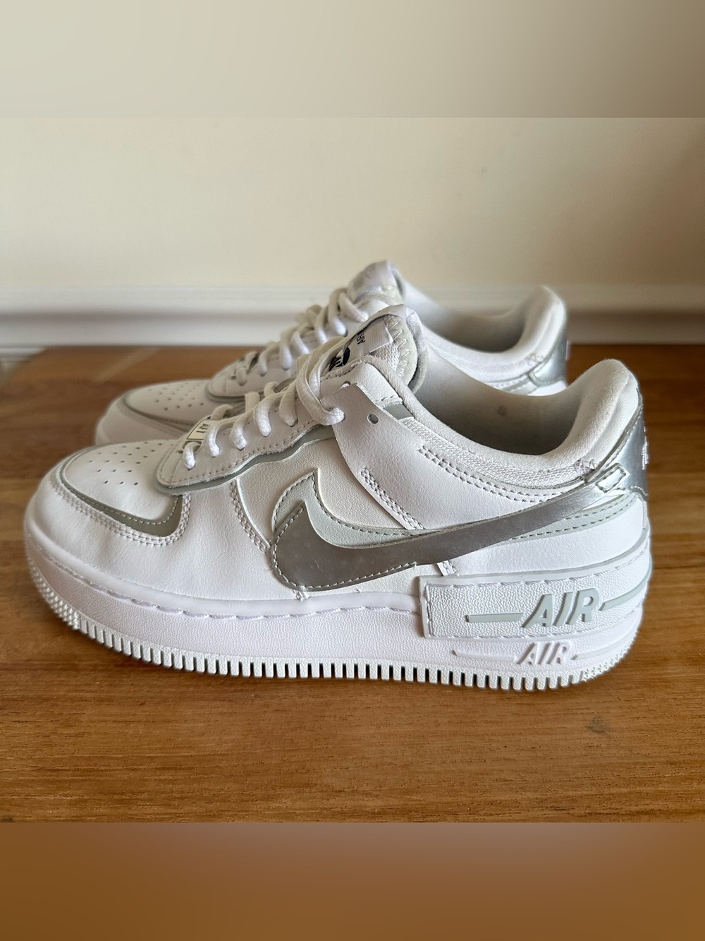 Nike White Sneakers with Metallic Silver Swoosh - Picture 6 of 11